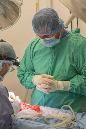 Student extern observing surgery