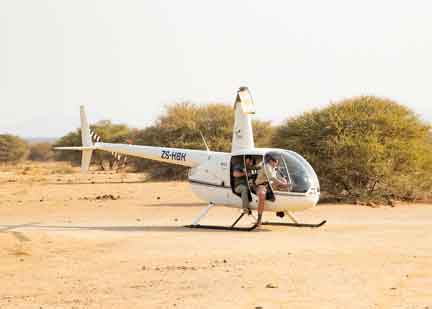 Andre in the helicopter on the ground just prior to takeoff