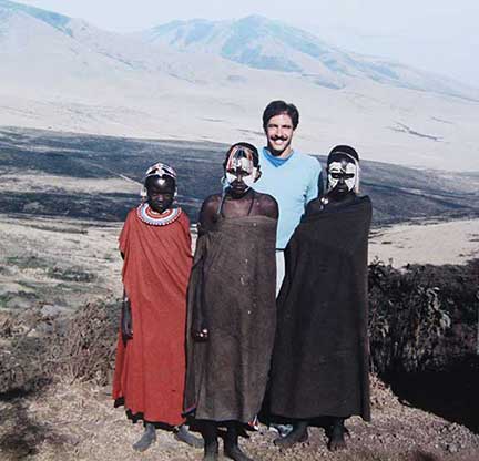 Dr. P in Tanzania on his first trip with some local Masai girls